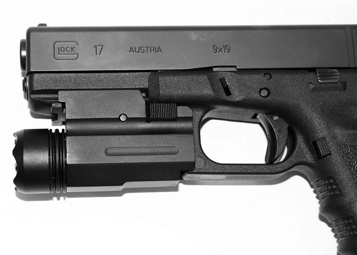 aluminum tactical black flashlight for glock 17 pistol.